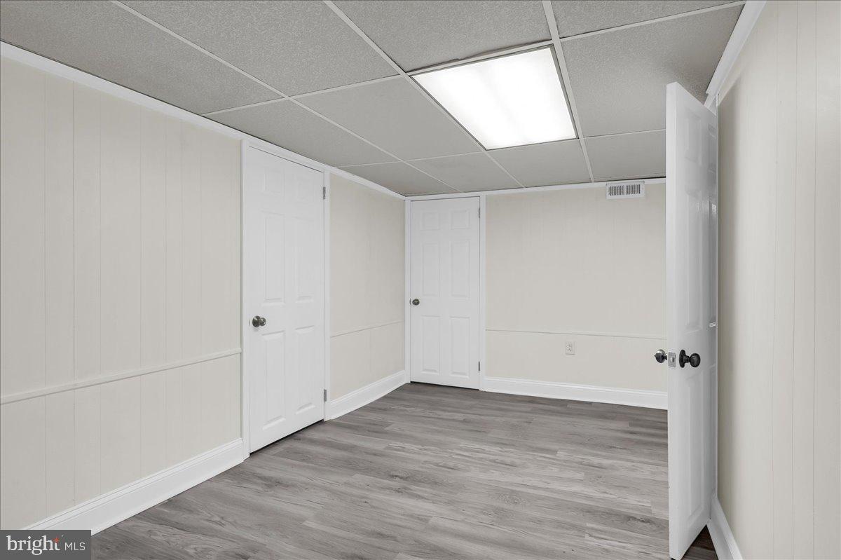 12 West Dale Road Wilmington, DE 19810 - Photo 31 of 44 a view of room with window and wooden floor