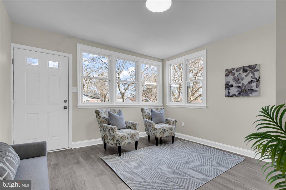 12 West Dale Road Wilmington, DE 19810 - Photo 4 of 44 a living room with furniture and wooden floor