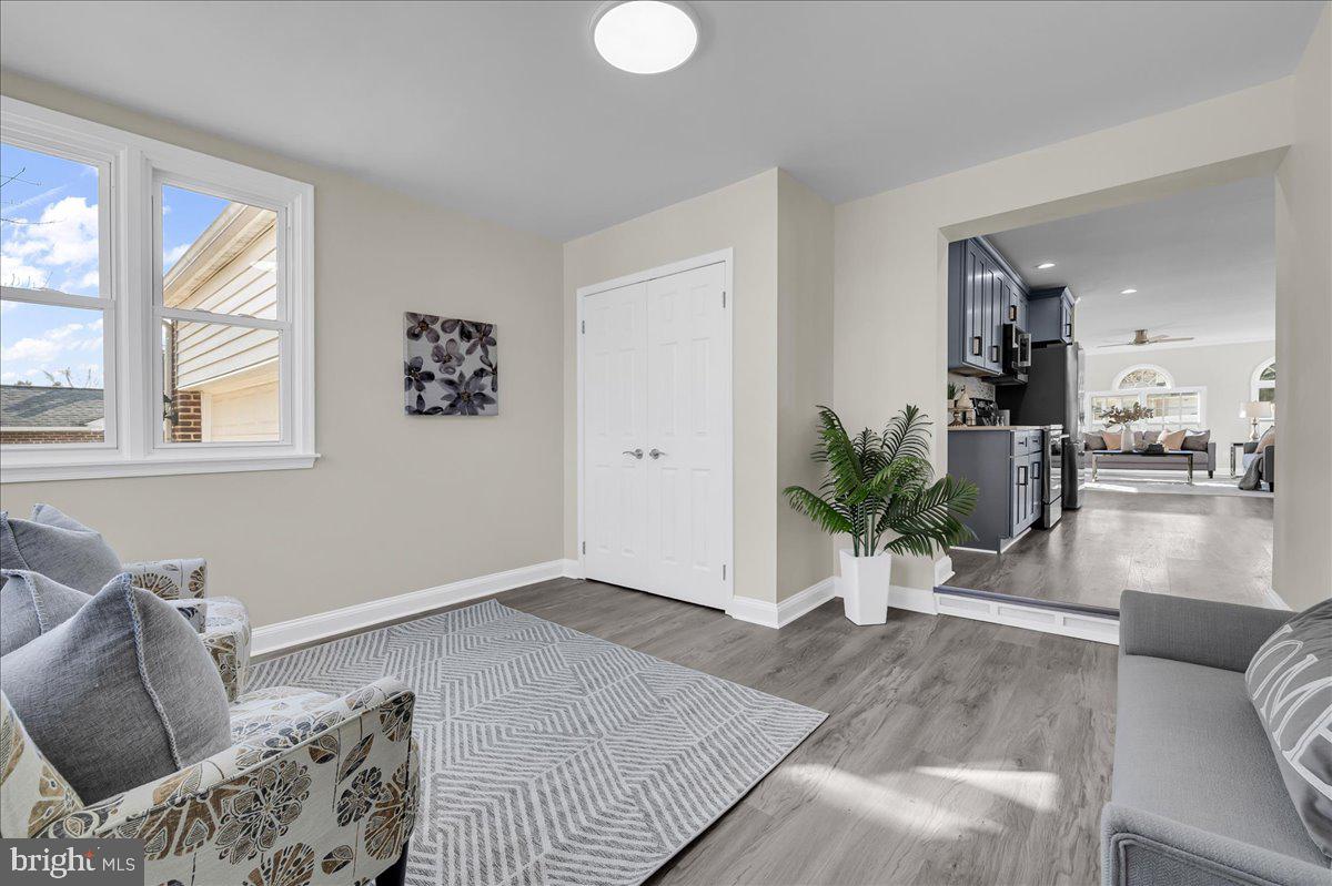 12 West Dale Road Wilmington, DE 19810 - Photo 5 of 44 a living room with furniture and a large window