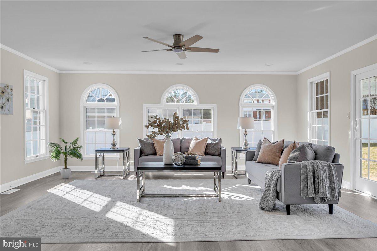 12 West Dale Road Wilmington, DE 19810 - Photo 8 of 44 a living room with furniture and a large window