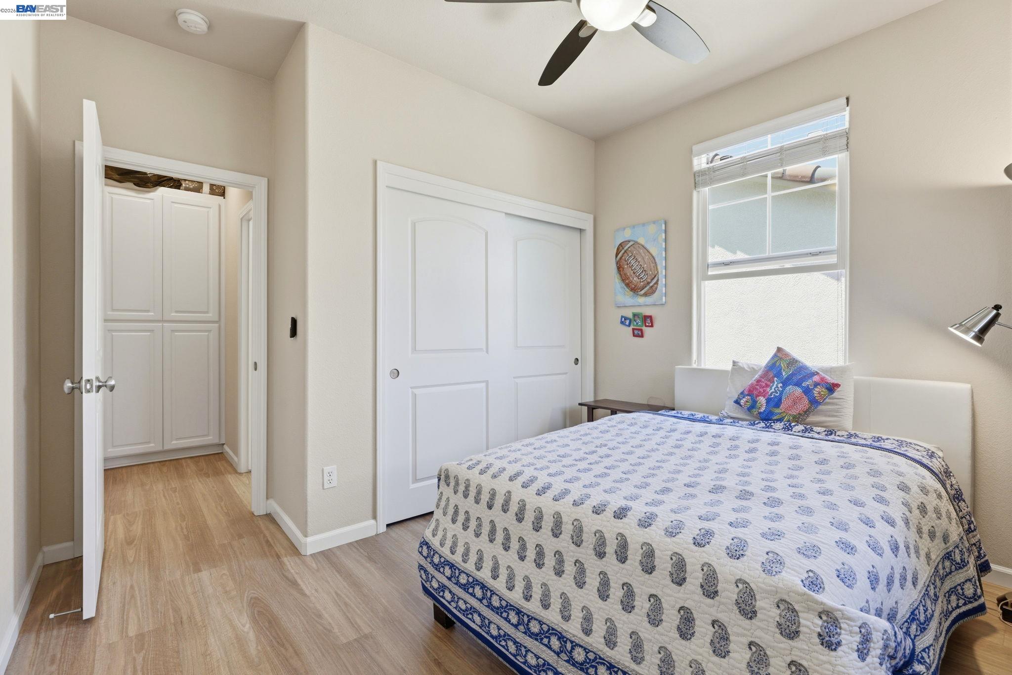5029 Queensbury Way San Ramon, CA 94582 - Photo 27 of 58 a bedroom with a bed and a dresser