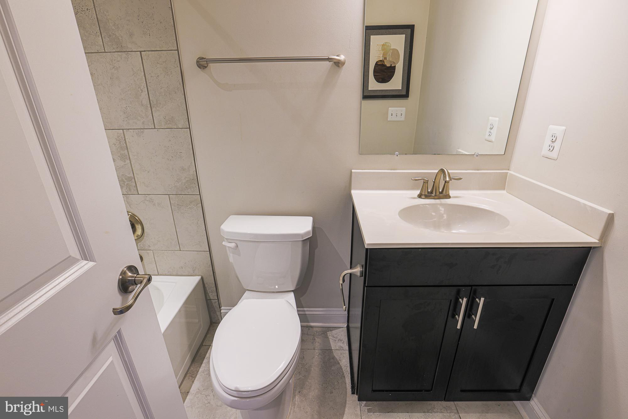 7104 Druce Way Hanover, MD 21076 - Photo 26 of 31 hall bathroom for bedrooms