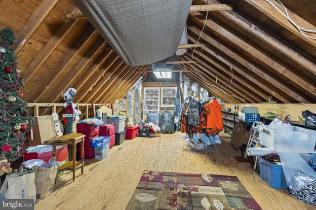 a patio with a patio table and chairs