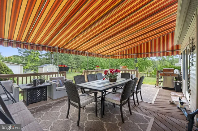 a house with trees in the background