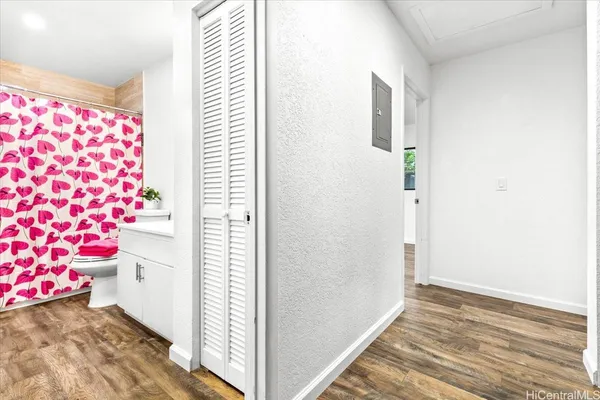 a utility room with sink dryer and washer