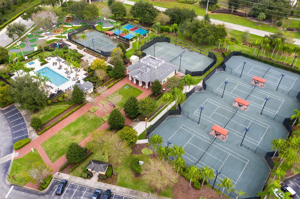 7593 Gathering Drive, Unit 802 Reunion, FL 34747 - Photo 28 of 34 an aerial view of residential houses with outdoor space