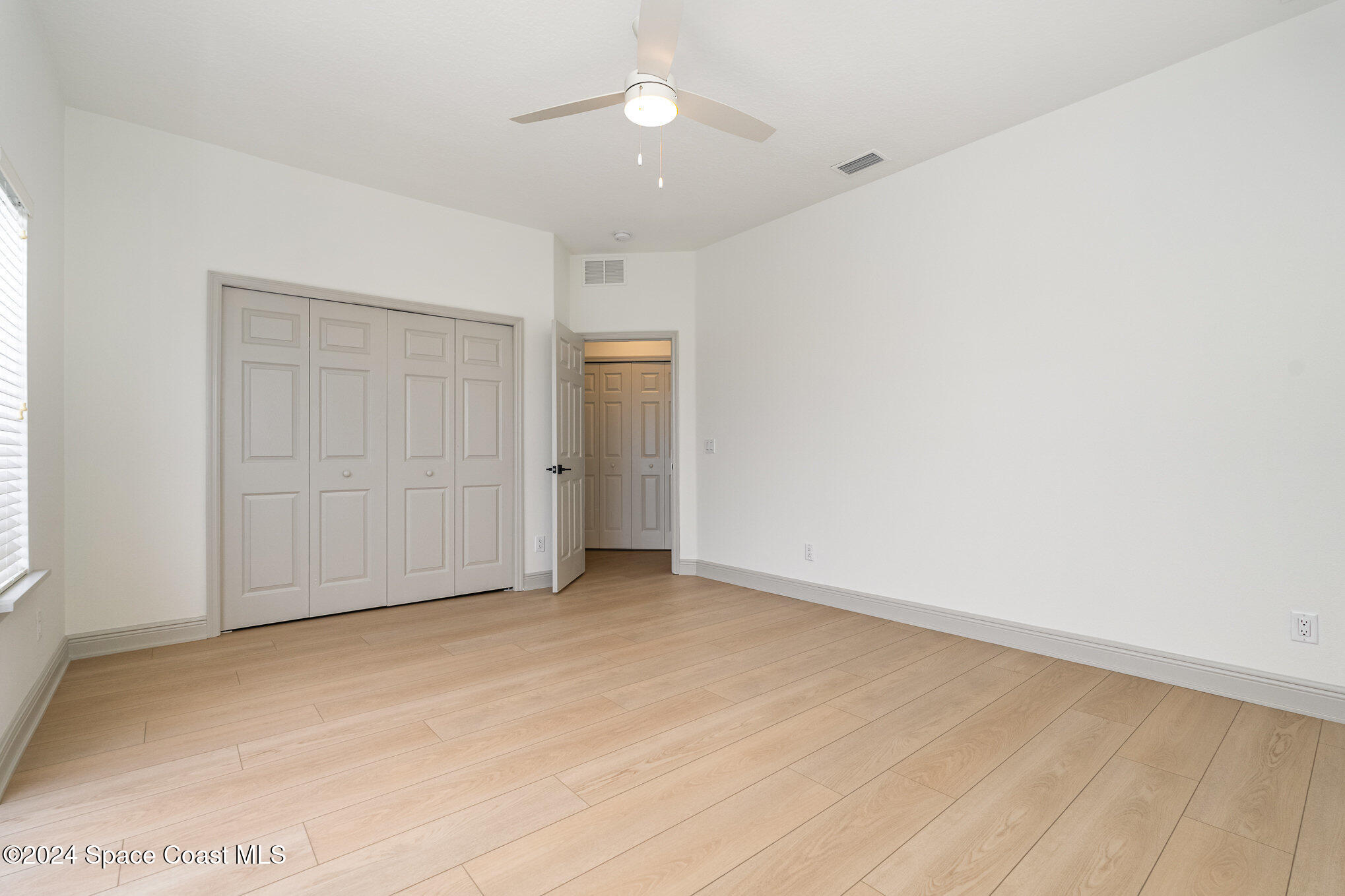 16 South Court Indialantic, FL 32903 - Photo 14 of 20 wooden floor in an empty room