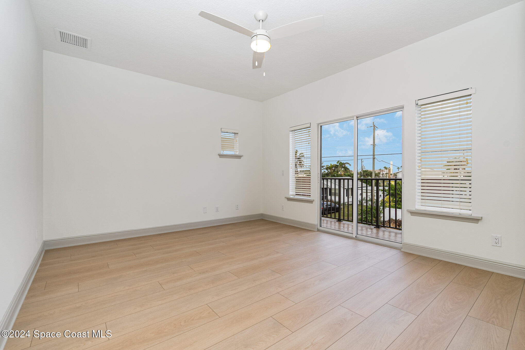 16 South Court Indialantic, FL 32903 - Photo 6 of 20 a view of an empty room with a window
