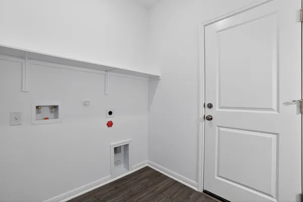 a white room with wooden floor