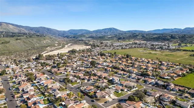 an aerial view of residential house and outdoor space