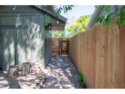 a view of a back yard of a house