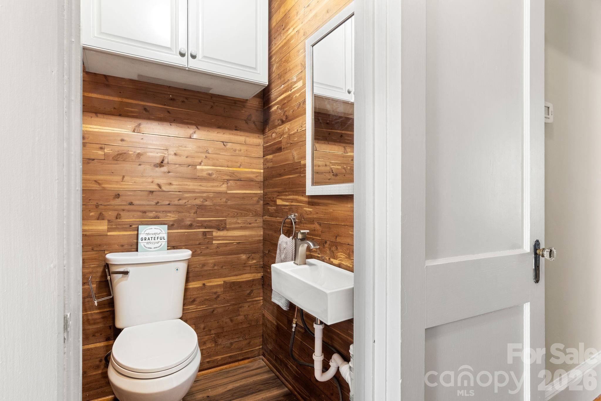 108 Reedy Street Chester, SC 29706 - Photo 29 of 42 a bathroom with a toilet a sink and shower