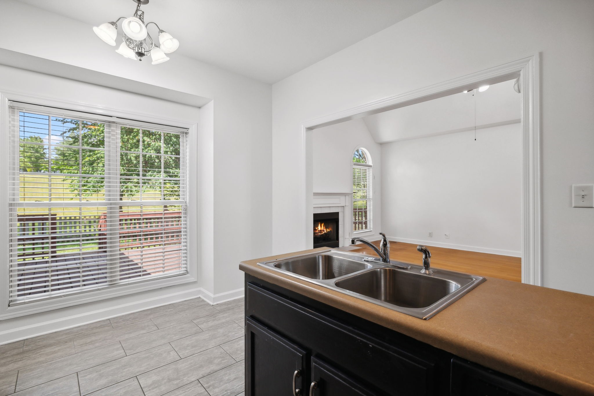 3575 Rabbit Run Trail Clarksville, TN 37043 - Photo 14 of 46 a kitchen with a sink cabinets and window