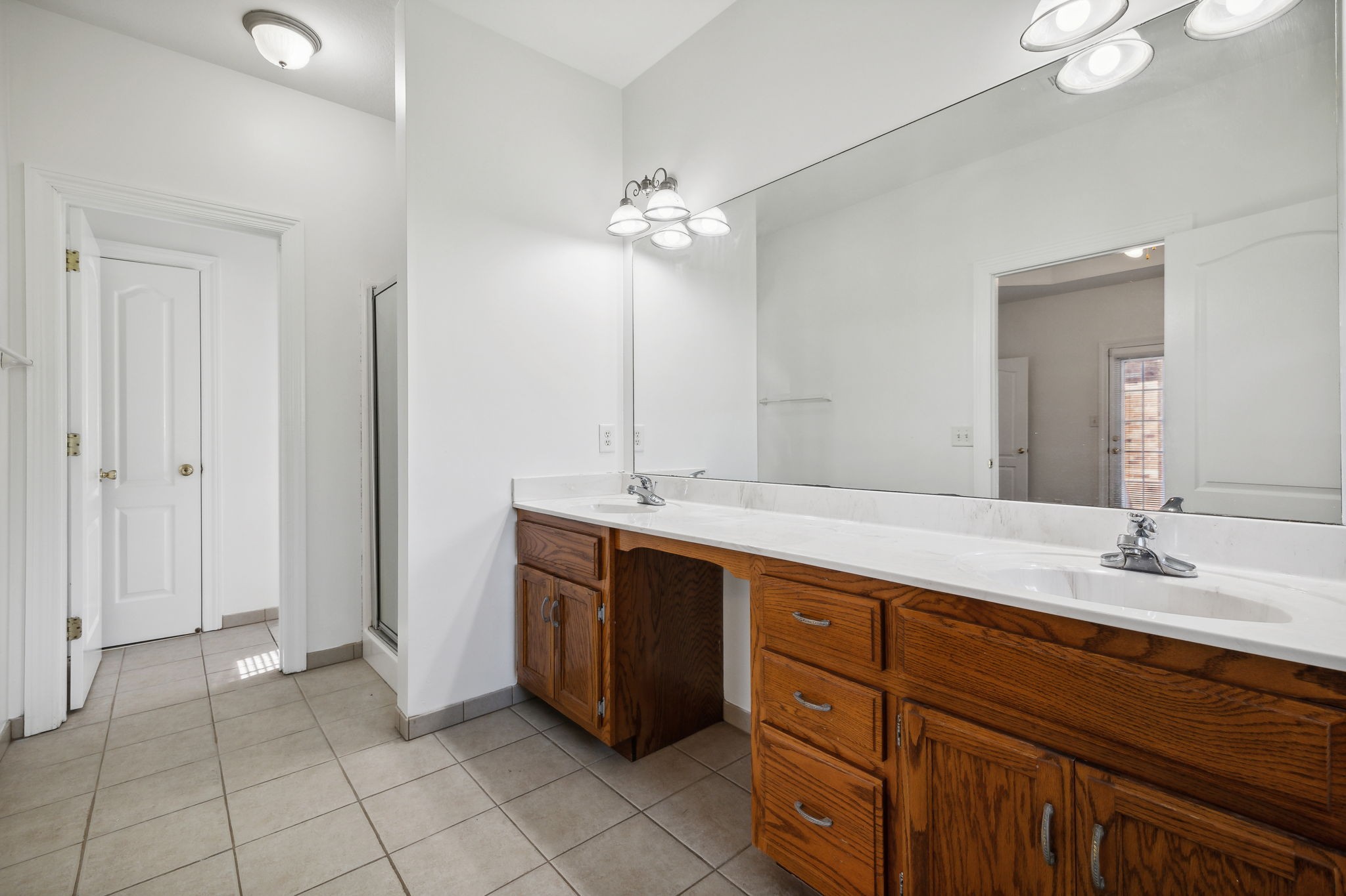 3575 Rabbit Run Trail Clarksville, TN 37043 - Photo 20 of 46 a spacious bathroom with a granite countertop sink a mirror and a
