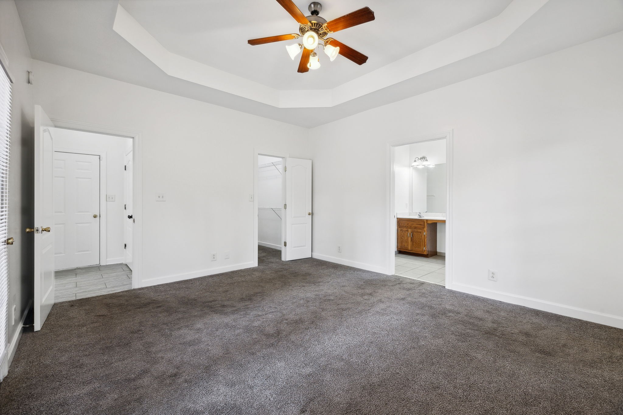 3575 Rabbit Run Trail Clarksville, TN 37043 - Photo 22 of 46 a view of an empty room with window and a ceiling fan