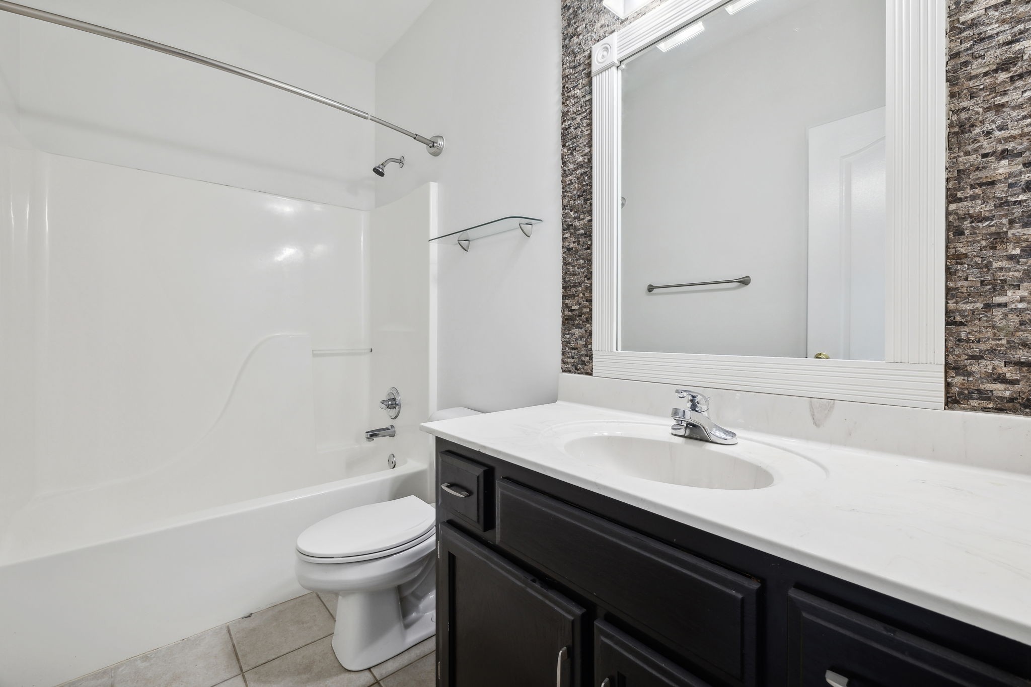 3575 Rabbit Run Trail Clarksville, TN 37043 - Photo 25 of 46 a bathroom with a sink a toilet a mirror and shower