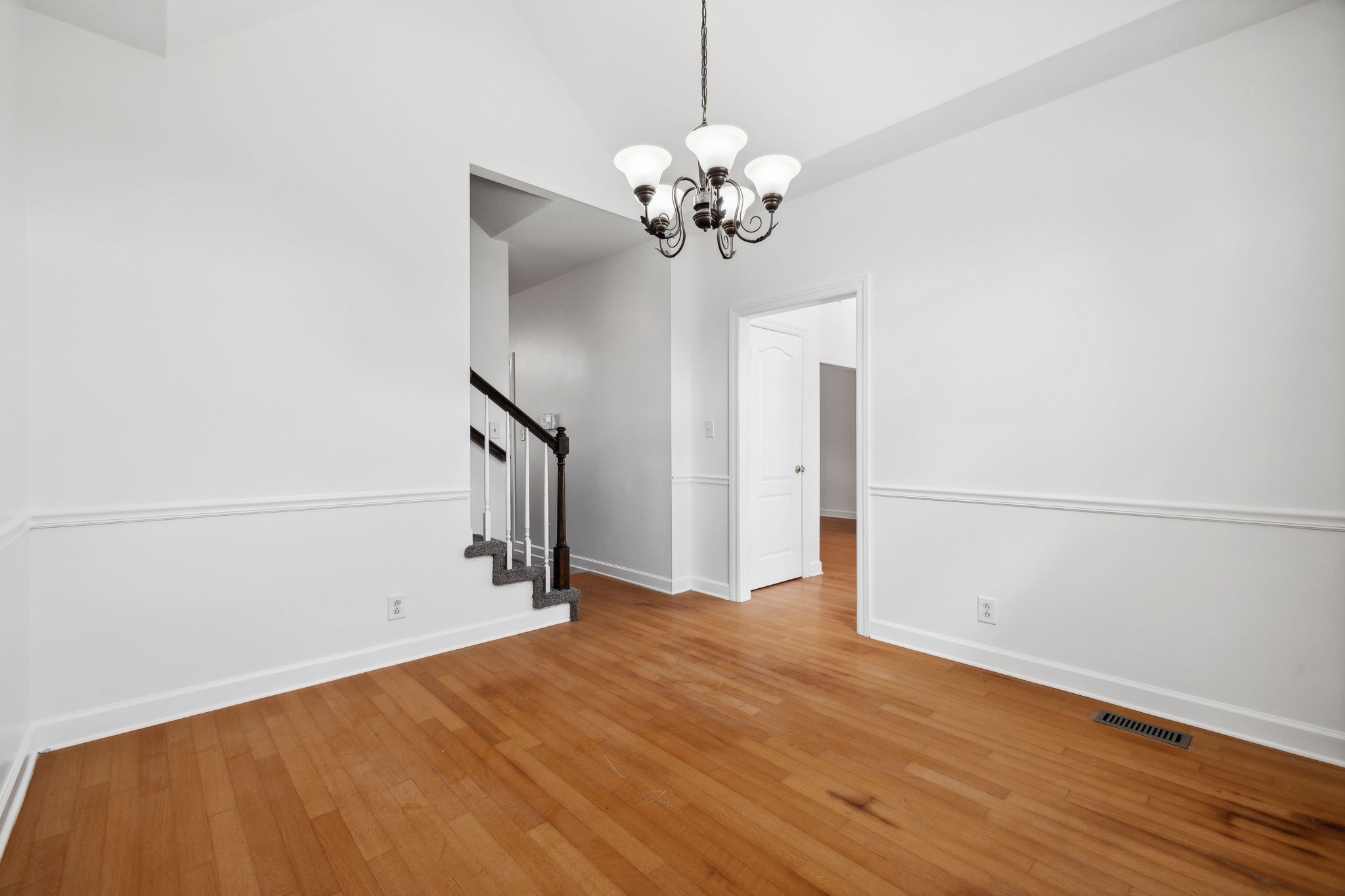 3575 Rabbit Run Trail Clarksville, TN 37043 - Photo 10 of 46 a view of an empty room with wooden floor