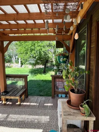 a bedroom with a bed and wall painting