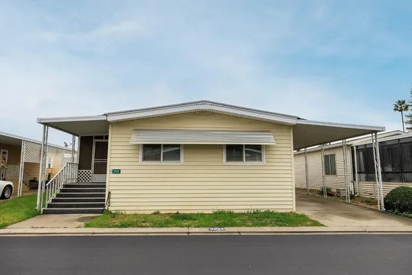 a house view with a outdoor space