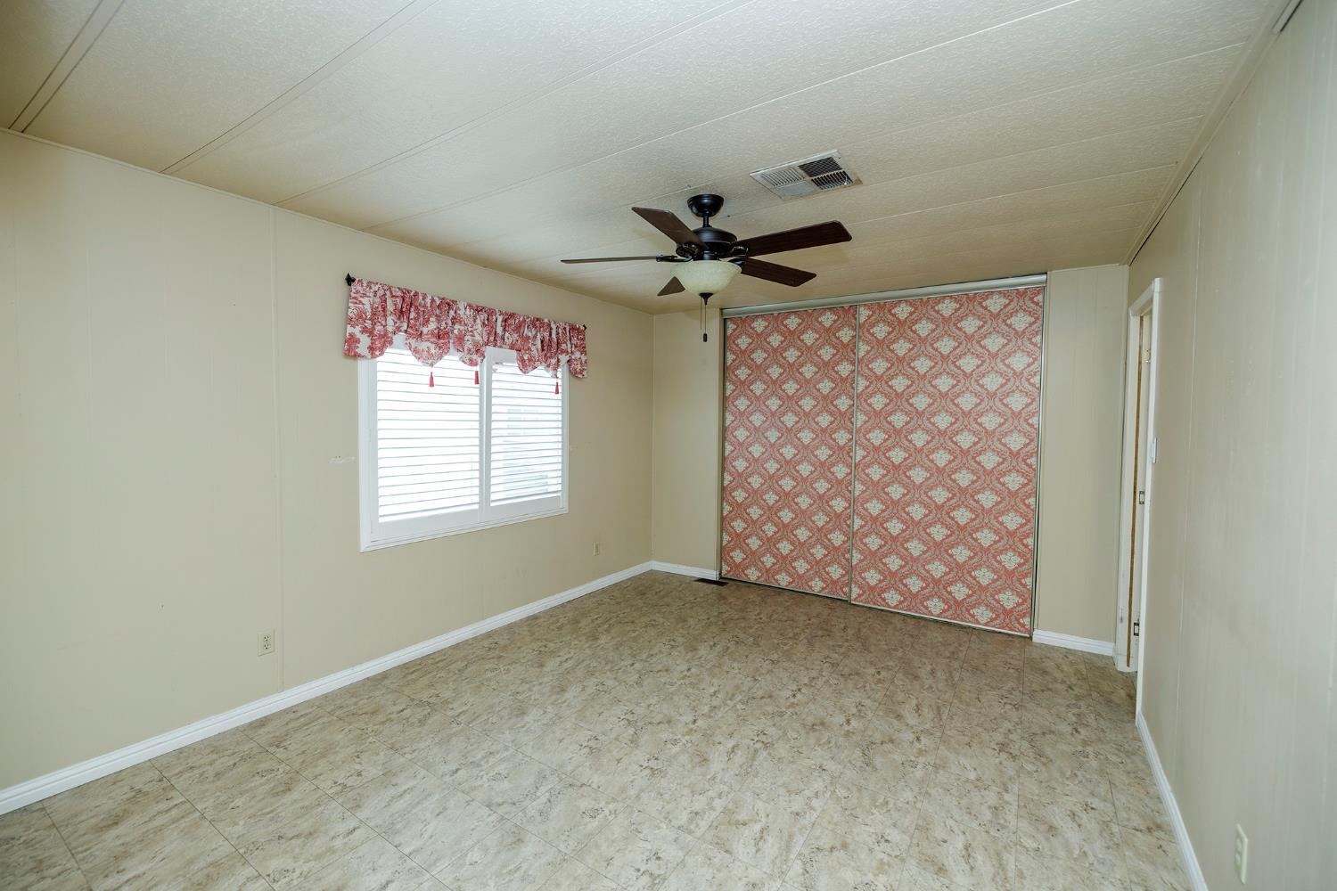 3924 Lahaina Lane Modesto, CA 95355 - Photo 22 of 32 a view of an empty room with a window