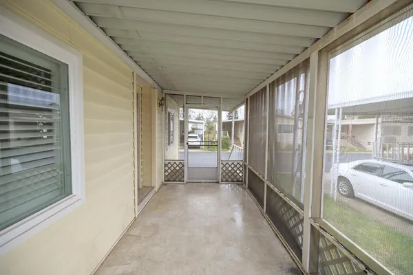 a view of kitchen with furniture and window