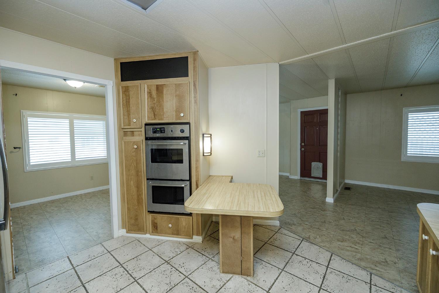 3924 Lahaina Lane Modesto, CA 95355 - Photo 10 of 32 a view of kitchen with furniture and window