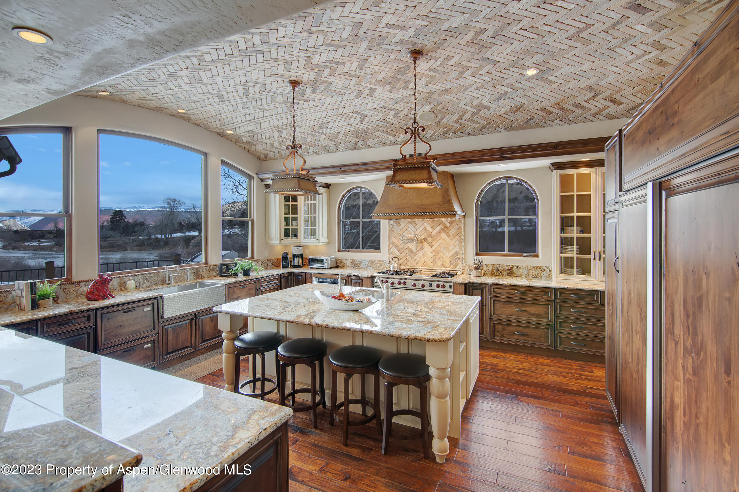 160 River Glen Road Carbondale, CO 81623 - Photo 11 of 24 a view of a dining room with furniture window and wooden floor