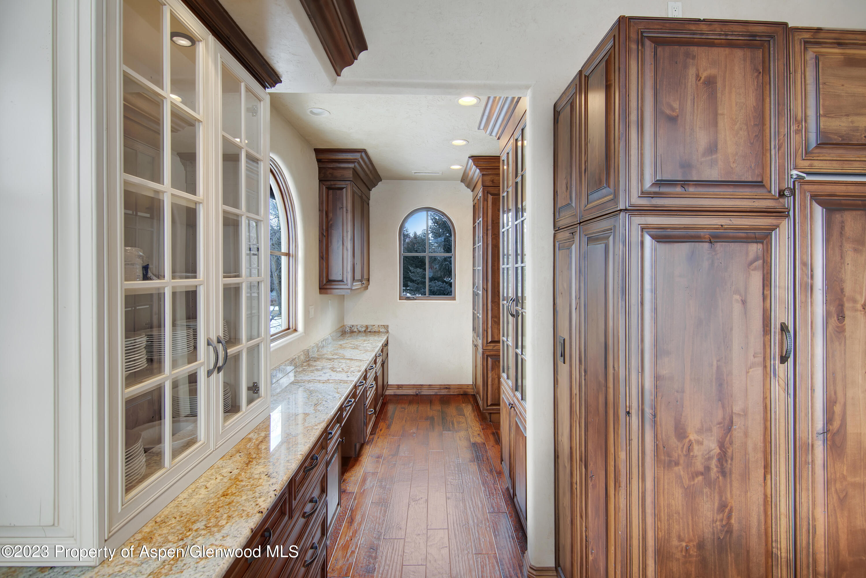 160 River Glen Road Carbondale, CO 81623 - Photo 12 of 24 a view of a hallway with wooden floor and staircase