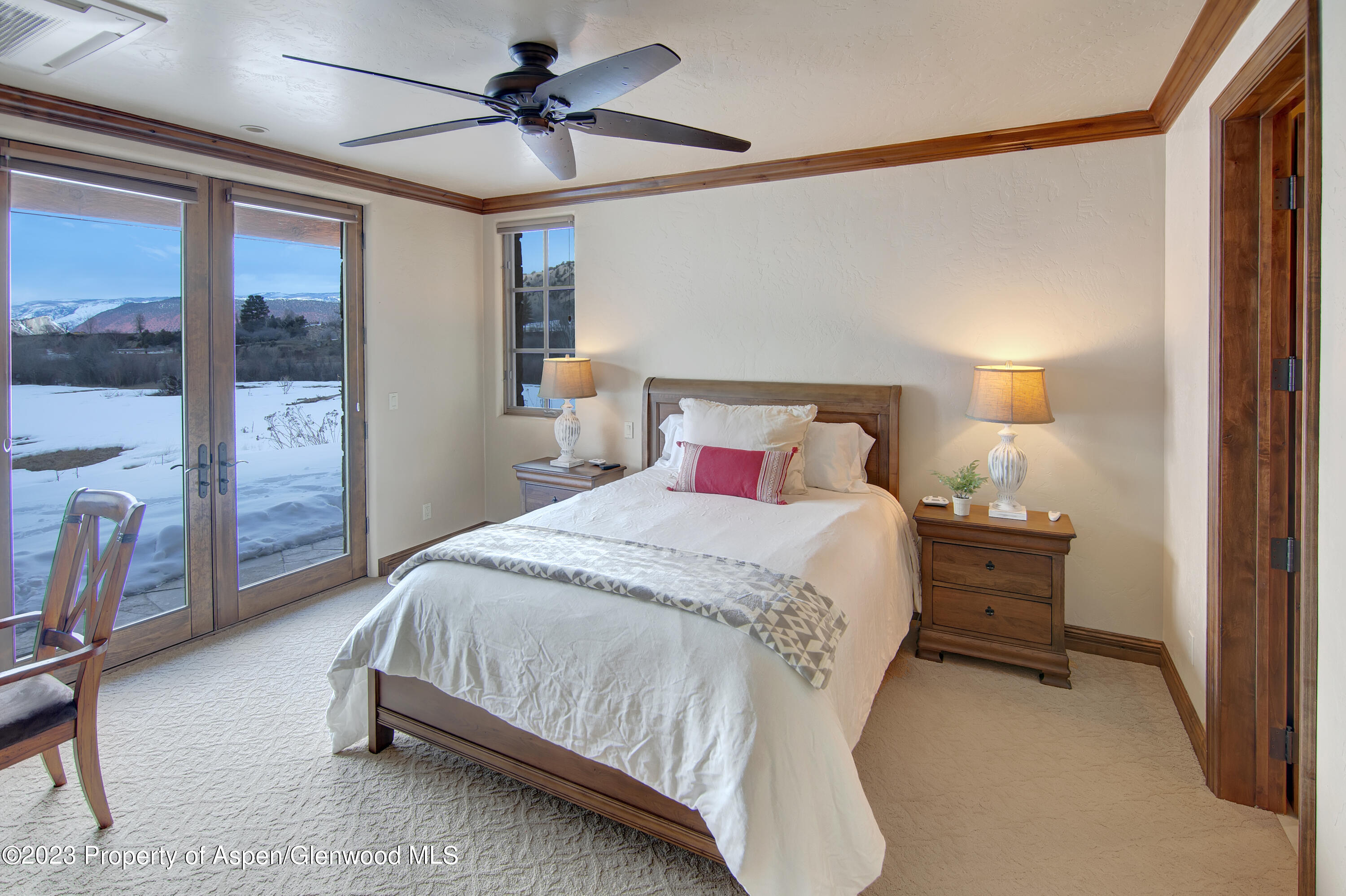 160 River Glen Road Carbondale, CO 81623 - Photo 15 of 24 a spacious bedroom with a bed and large mirror