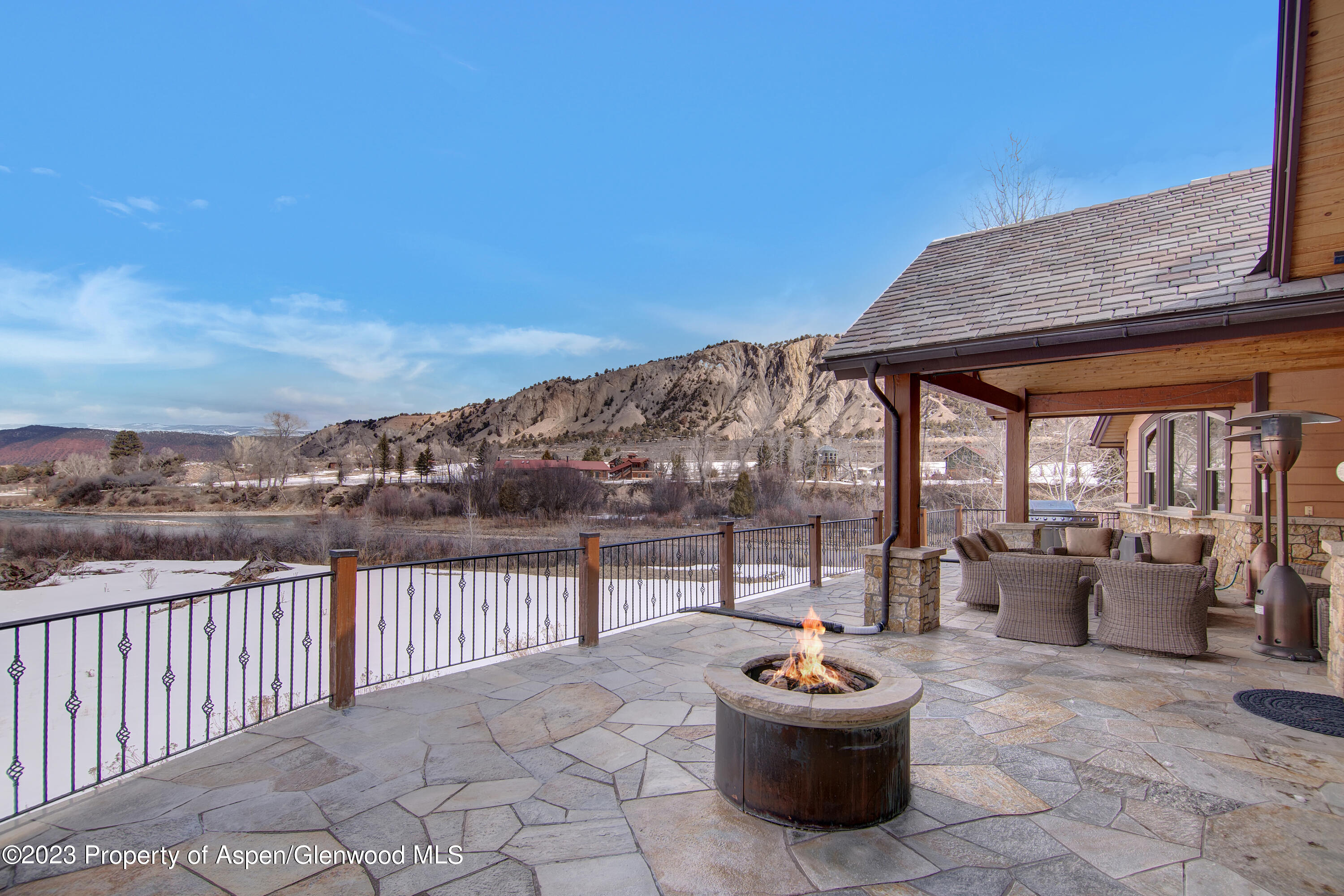 160 River Glen Road Carbondale, CO 81623 - Photo 17 of 24 a view of a patio with a table and chairs