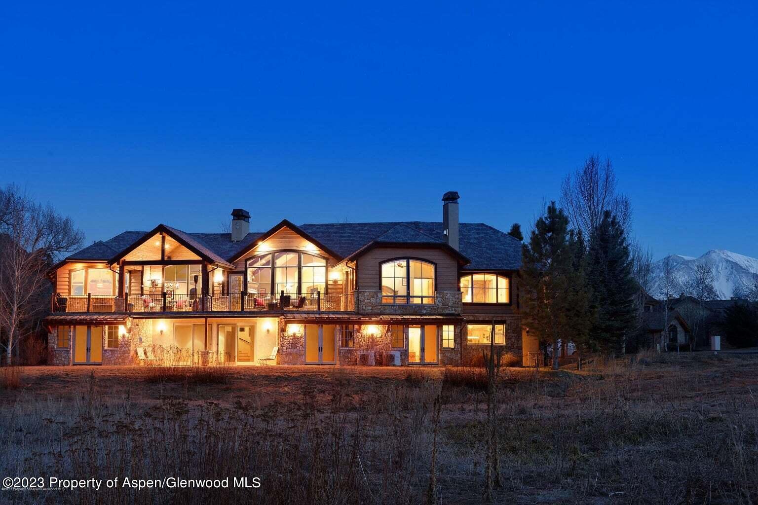 160 River Glen Road Carbondale, CO 81623 - Photo 21 of 24 a front view of a house with yard and green space