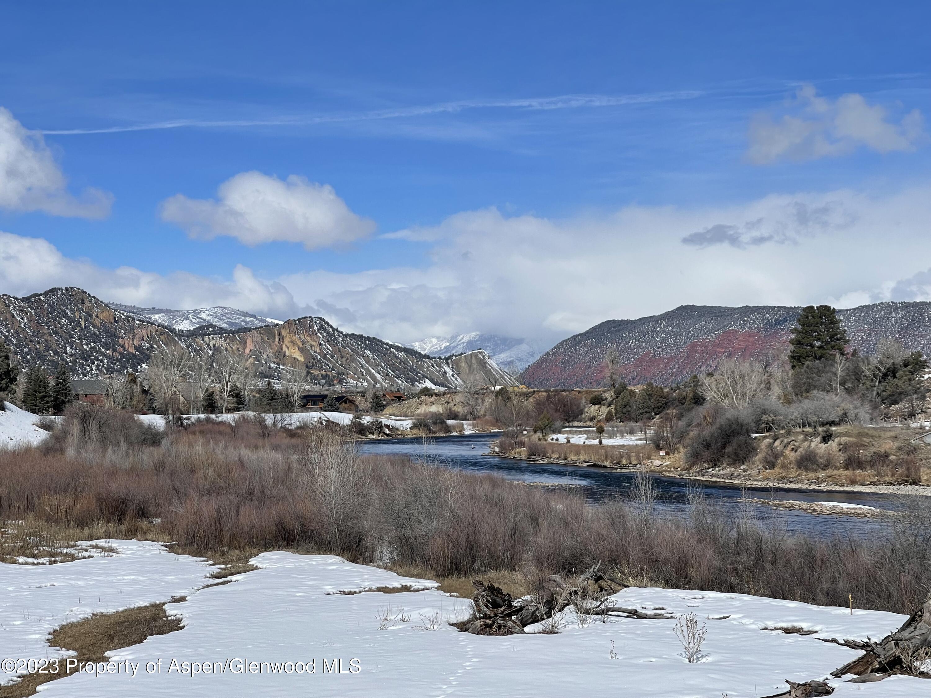160 River Glen Road Carbondale, CO 81623 - Photo 22 of 24 a view of a lake in middle of the town