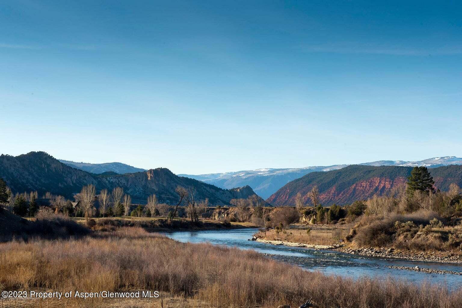 160 River Glen Road Carbondale, CO 81623 - Photo 24 of 24 a view of a house with a yard and a car park