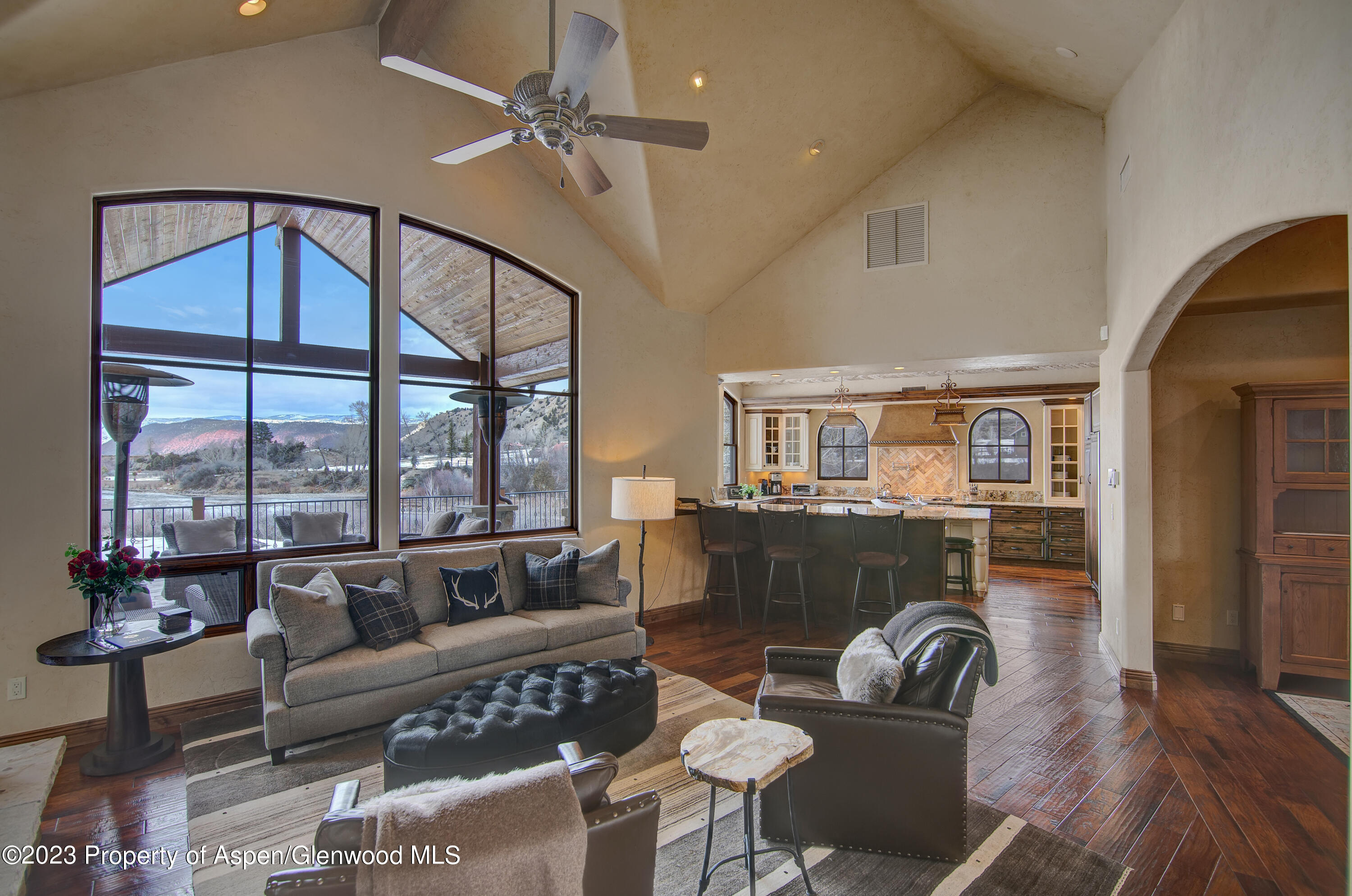 160 River Glen Road Carbondale, CO 81623 - Photo 4 of 24 a living room with furniture ceiling fan and a window