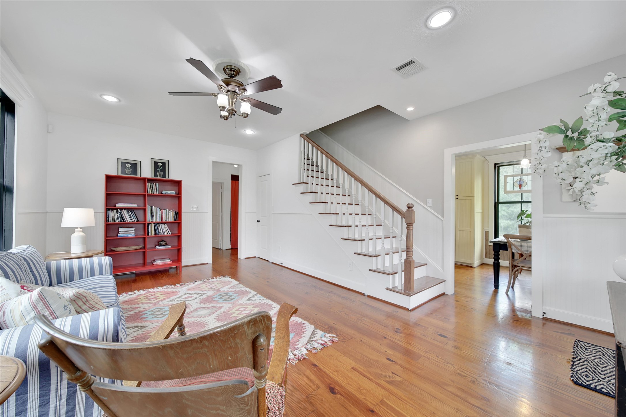 18875 Rabon Chapel Road Montgomery, TX 77316 - Photo 27 of 45 a living room with furniture and wooden floor