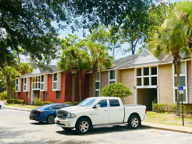 a car parked in front of a house
