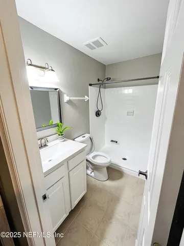 a view of a bathroom with a sink and toilet