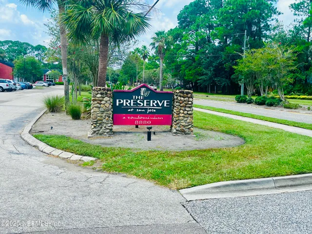 a room with gym equipment and a large window