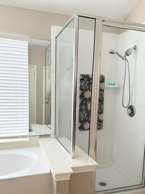2224 Kerr Trail Cedar Park, TX 78613 - Photo 11 of 15 a bathroom with a shower and a bath tub