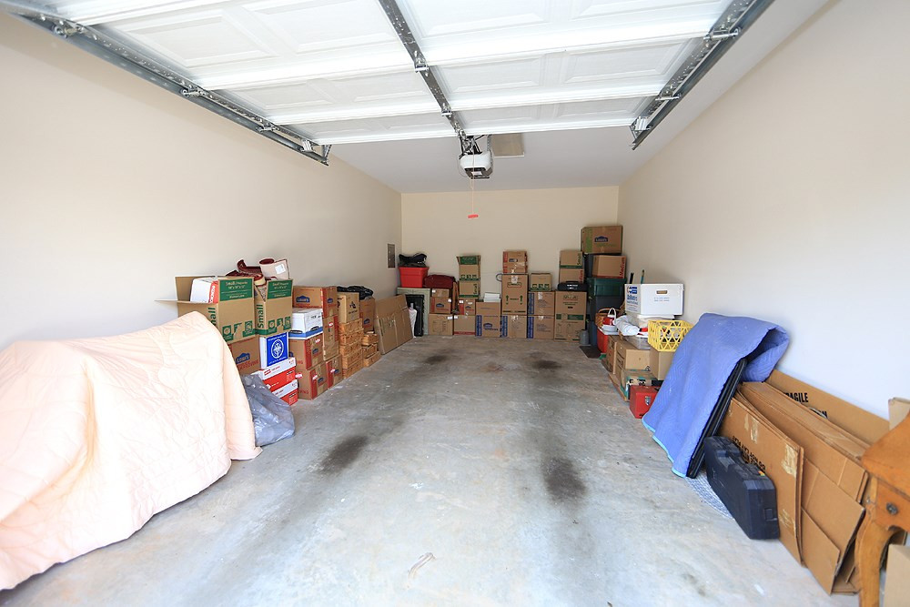 2041 Rivergate Road, Unit 103 Raleigh, NC 27614 - Photo 20 of 21 At 23 feet deep, you can store your extra belongings in the garage and STILL park your vehicle inside! Garage