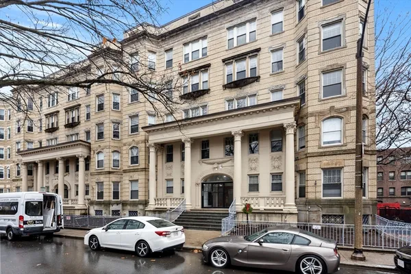 a car parked in front of a building