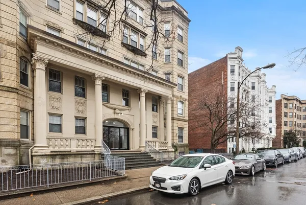 a car parked in front of a building