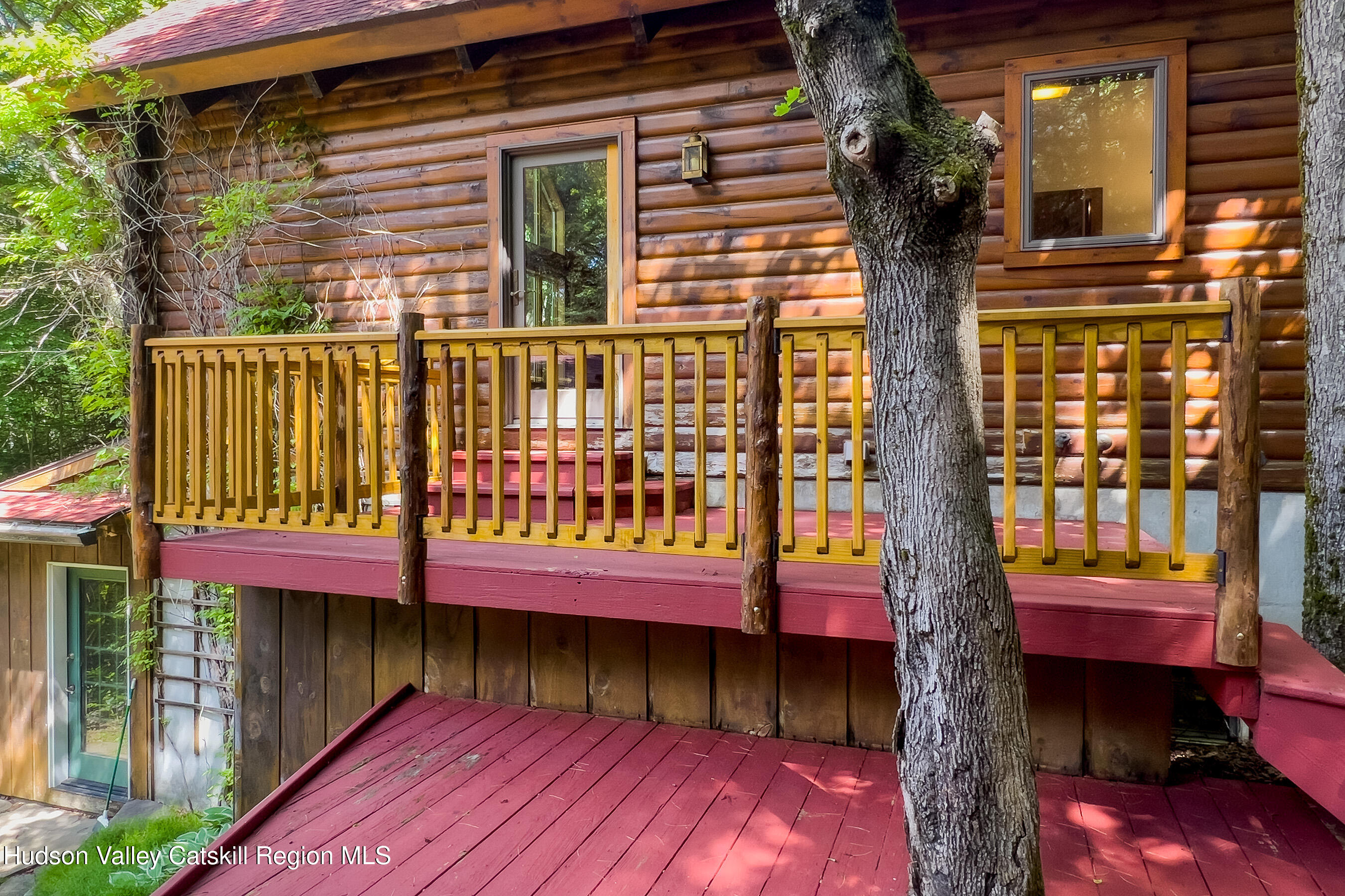 135 Sparrowhawk Lake Road Schenevus, NY 12155 - Photo 10 of 71 009 - Built within thre trees - 135 Spar