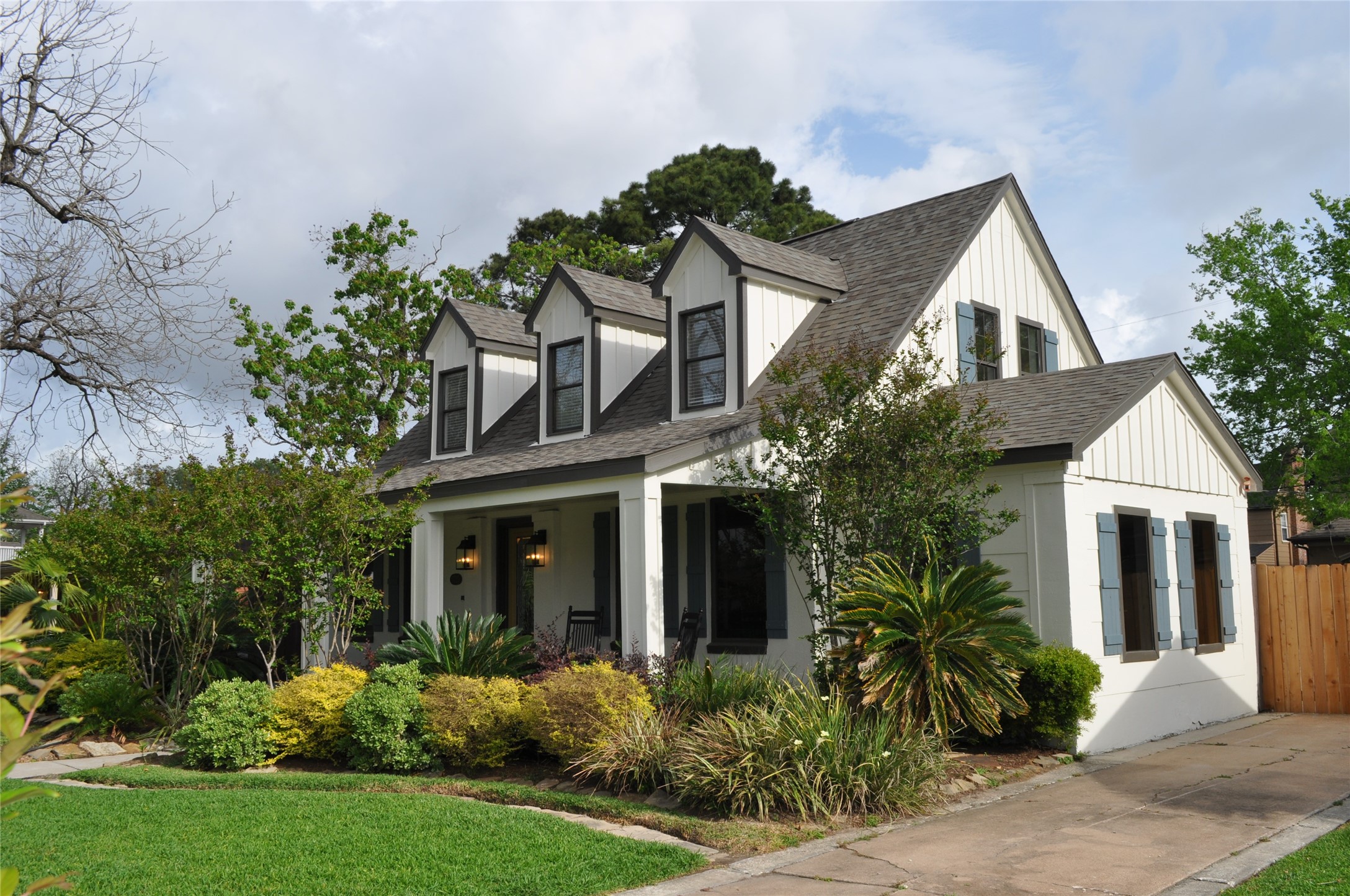 front view of a house with a yard