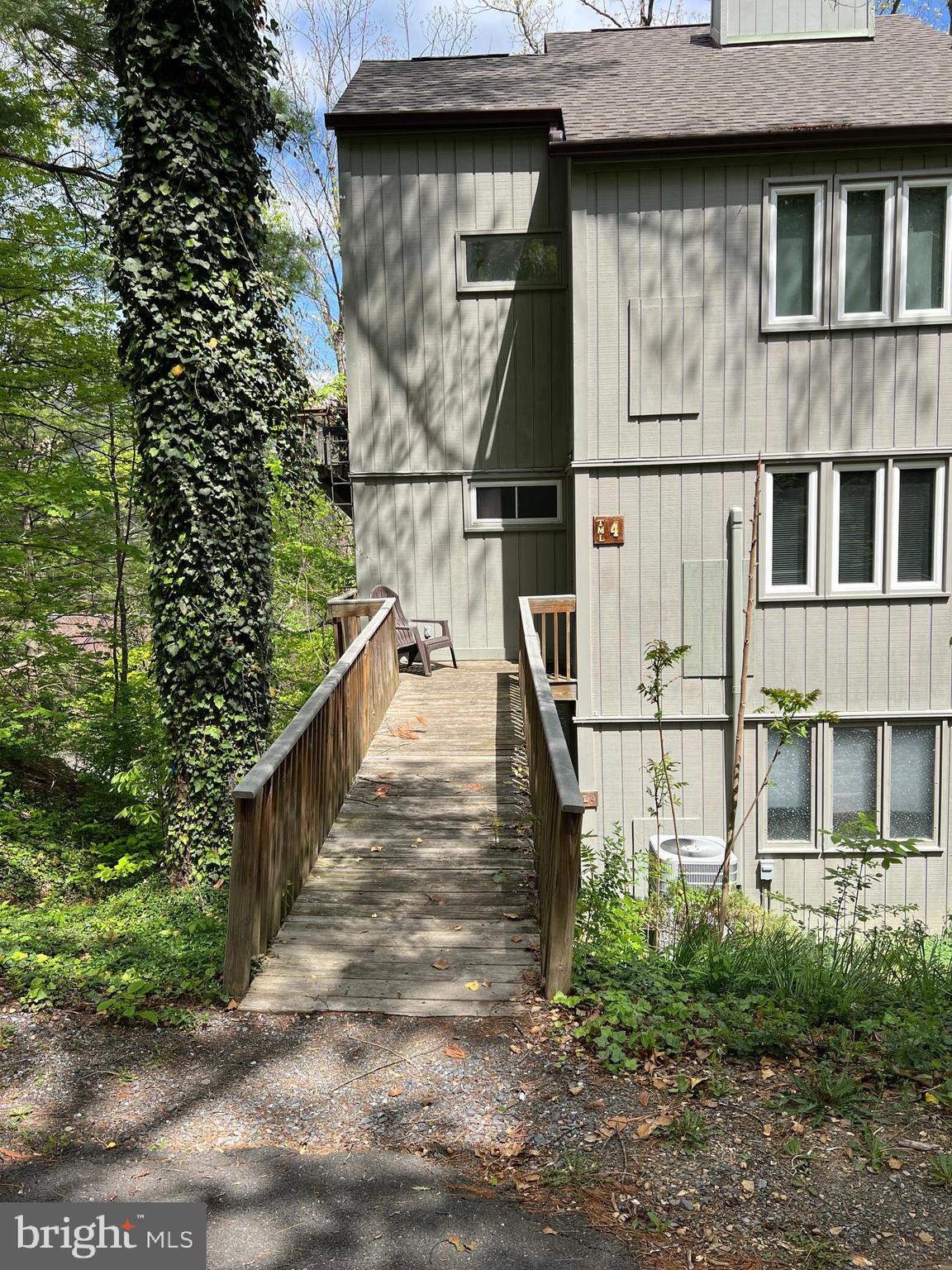 361 The Hill Road, Unit M4 Basye, VA 22810 - Photo 1 of 19 a view of a large building with many windows