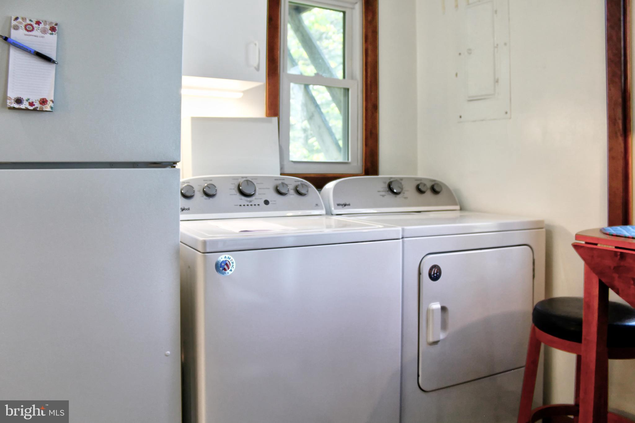 361 The Hill Road, Unit M4 Basye, VA 22810 - Photo 12 of 19 a utility room with dryer and washer