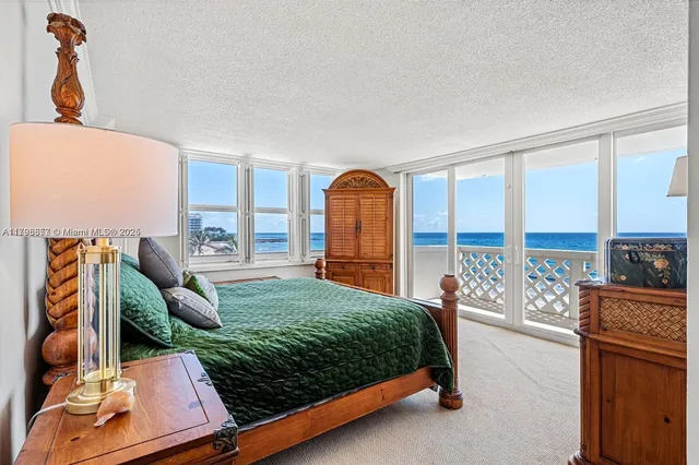 a utility room with cabinets dryer and washer