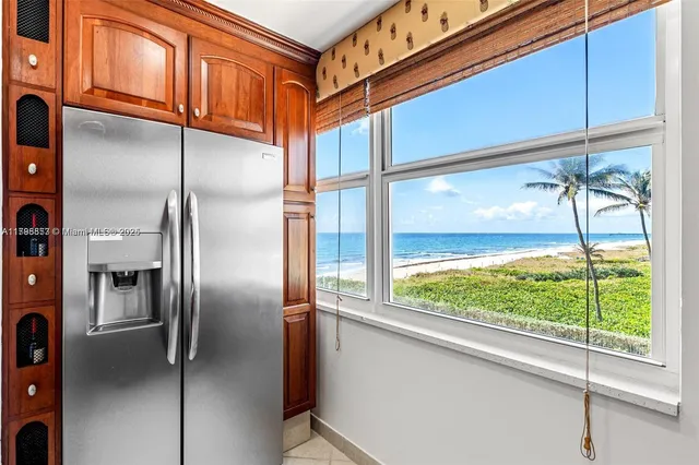 a kitchen that has a sink and a stove