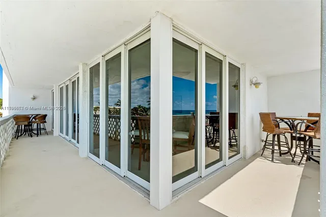 a bathroom with a sink toilet and mirror
