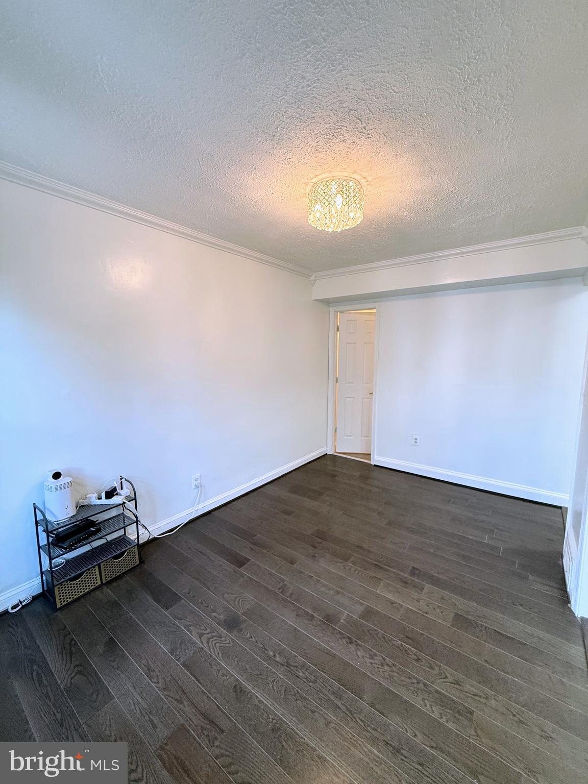 1714 E Street Northeast Washington, DC 20002 - Photo 11 of 30 a view of empty room with wooden floor